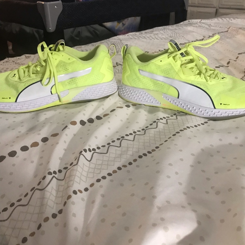 Practically brand new size 12 puma light weight running shoes.